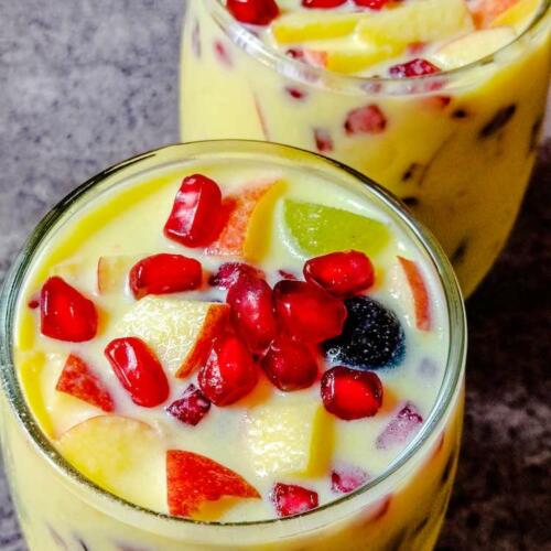 Fruit Custard served chilled in two glasses, by homemakerjob.com