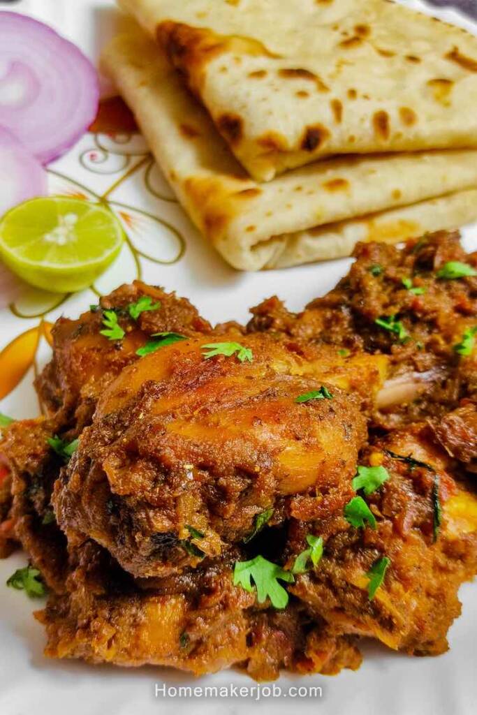 Ready Bhuna Chicken served with chapati and lemon by homemakerjob