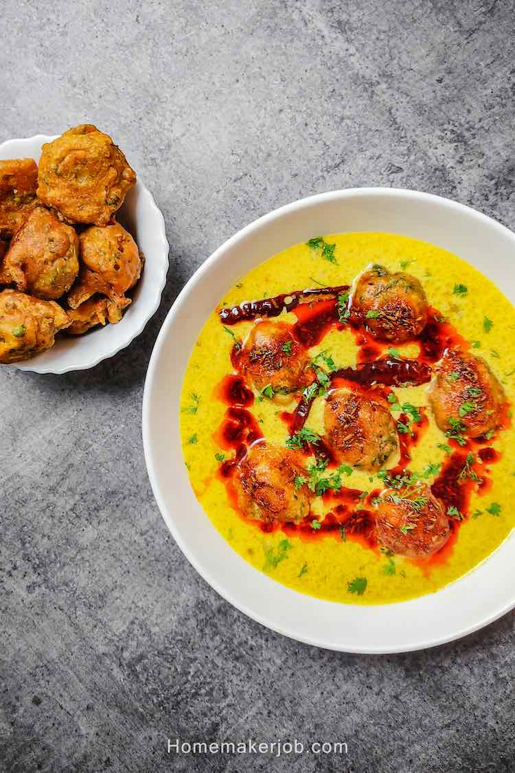 Photo of ready punjabi kadhi pakoda served with pakoras by homemakerjob.com