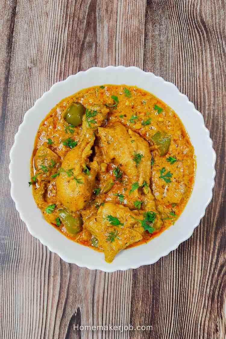 Top view photo of chicken Patiala served hot in a white dish by homemakerjob